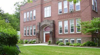 Exterior view of Fairport Senior Apartments at The Crosman